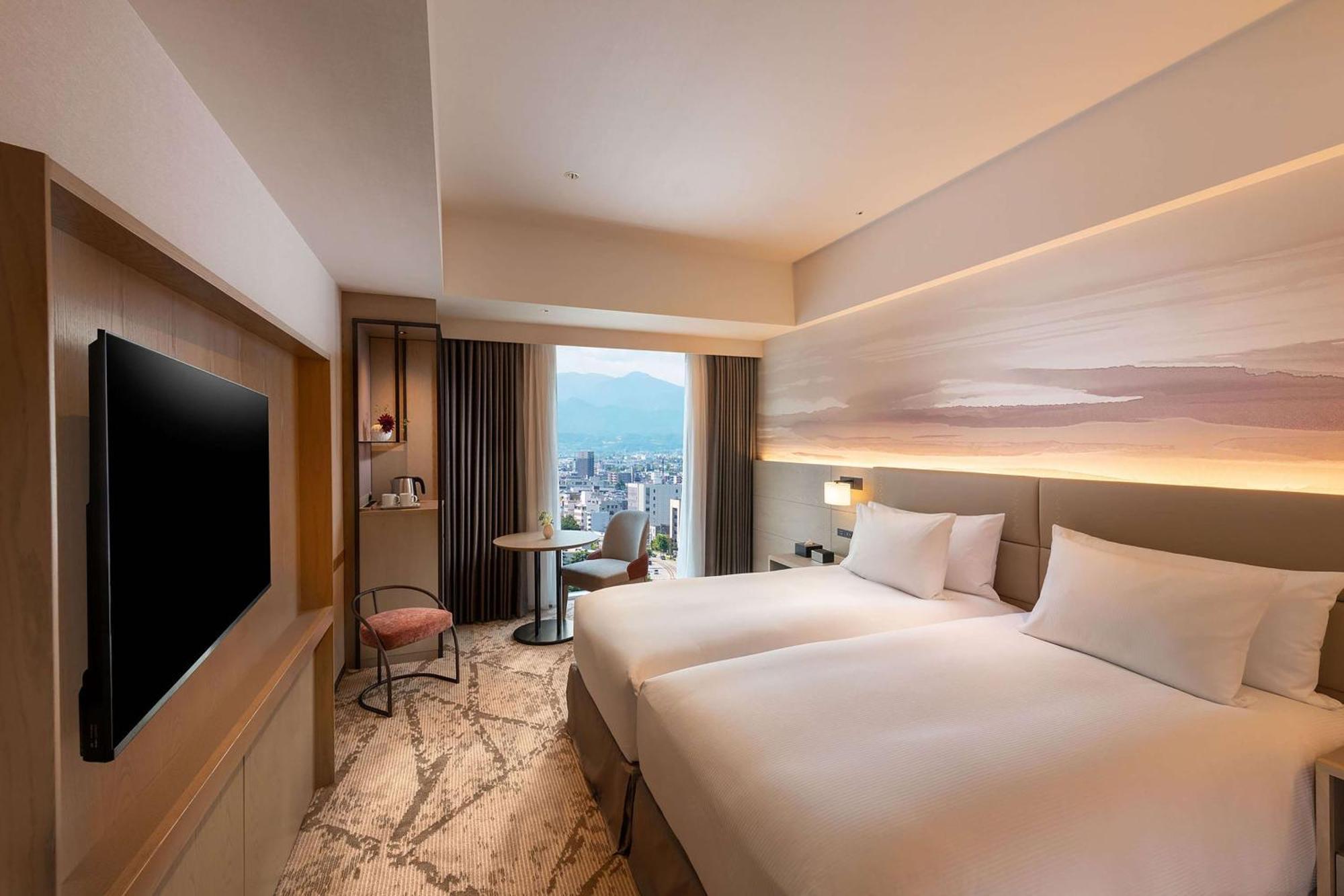 Отель Doubletree By Hilton Тояма Экстерьер фото