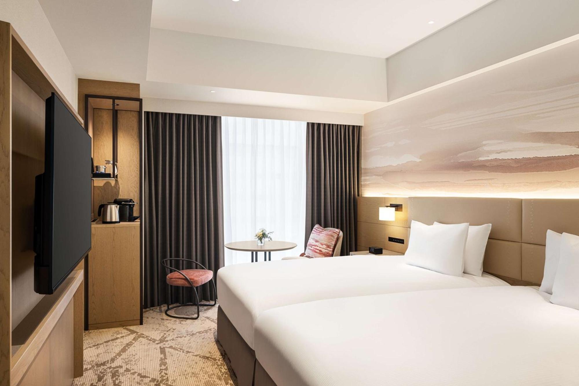 Отель Doubletree By Hilton Тояма Экстерьер фото